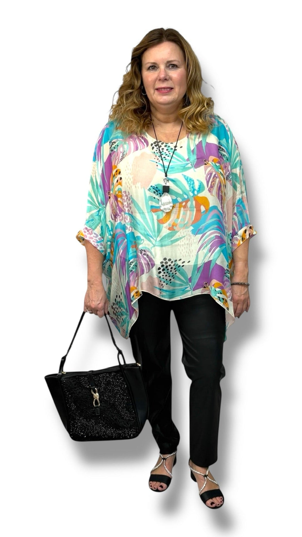 Versatile multicoloured shirt, one size fits most, can be worn untied or tied at the waist for a relaxed or styled look