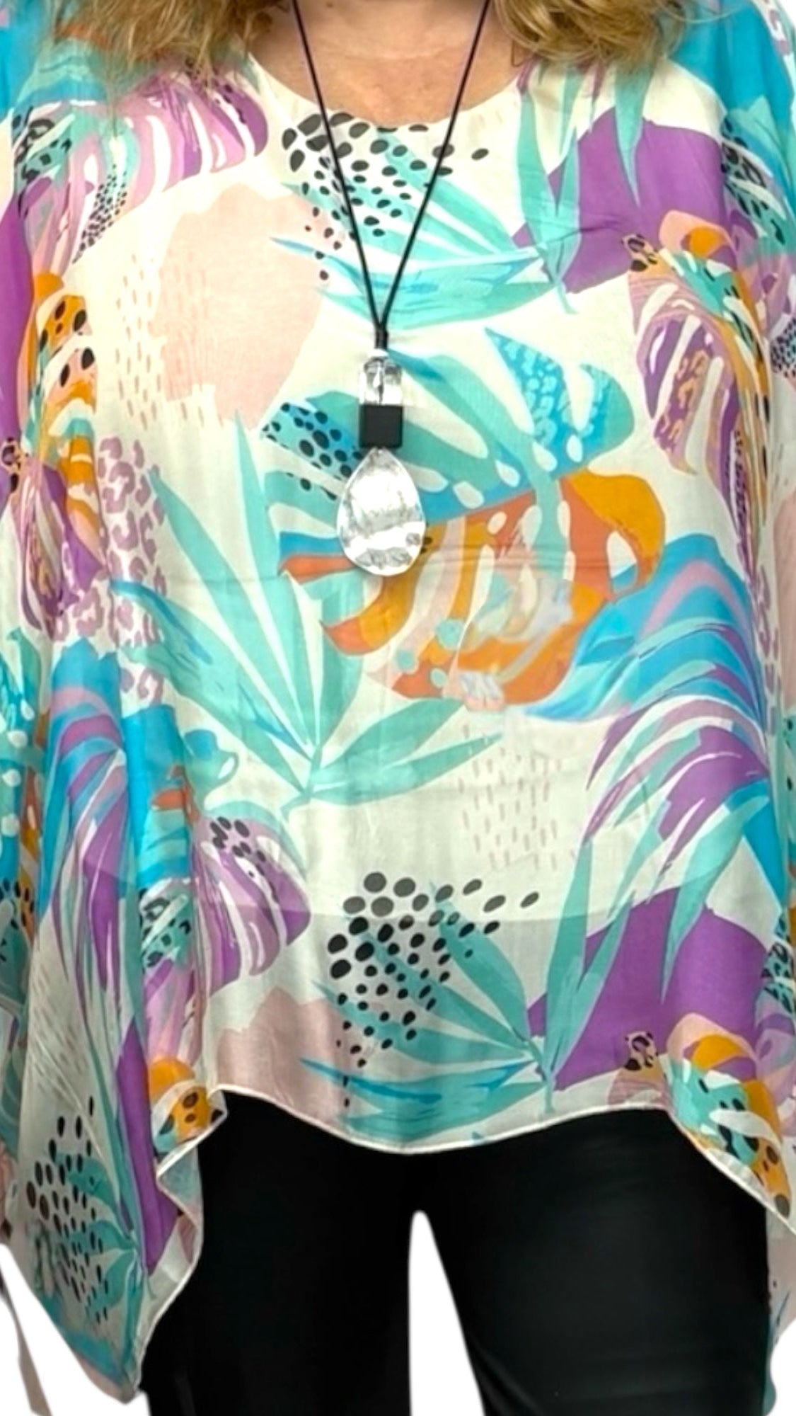 Close-up of vibrant multicoloured pattern on one-size-fits-most shirt