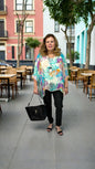 Versatile multicoloured shirt, one size fits most, can be worn untied or tied at the waist for a relaxed or styled look