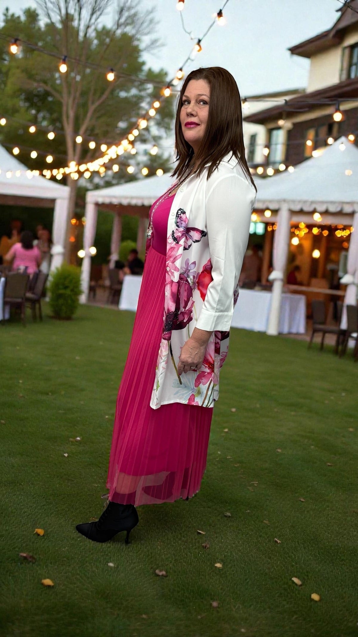 Vibrant pink dress with an easy, flattering silhouette styled for casual and everyday wear