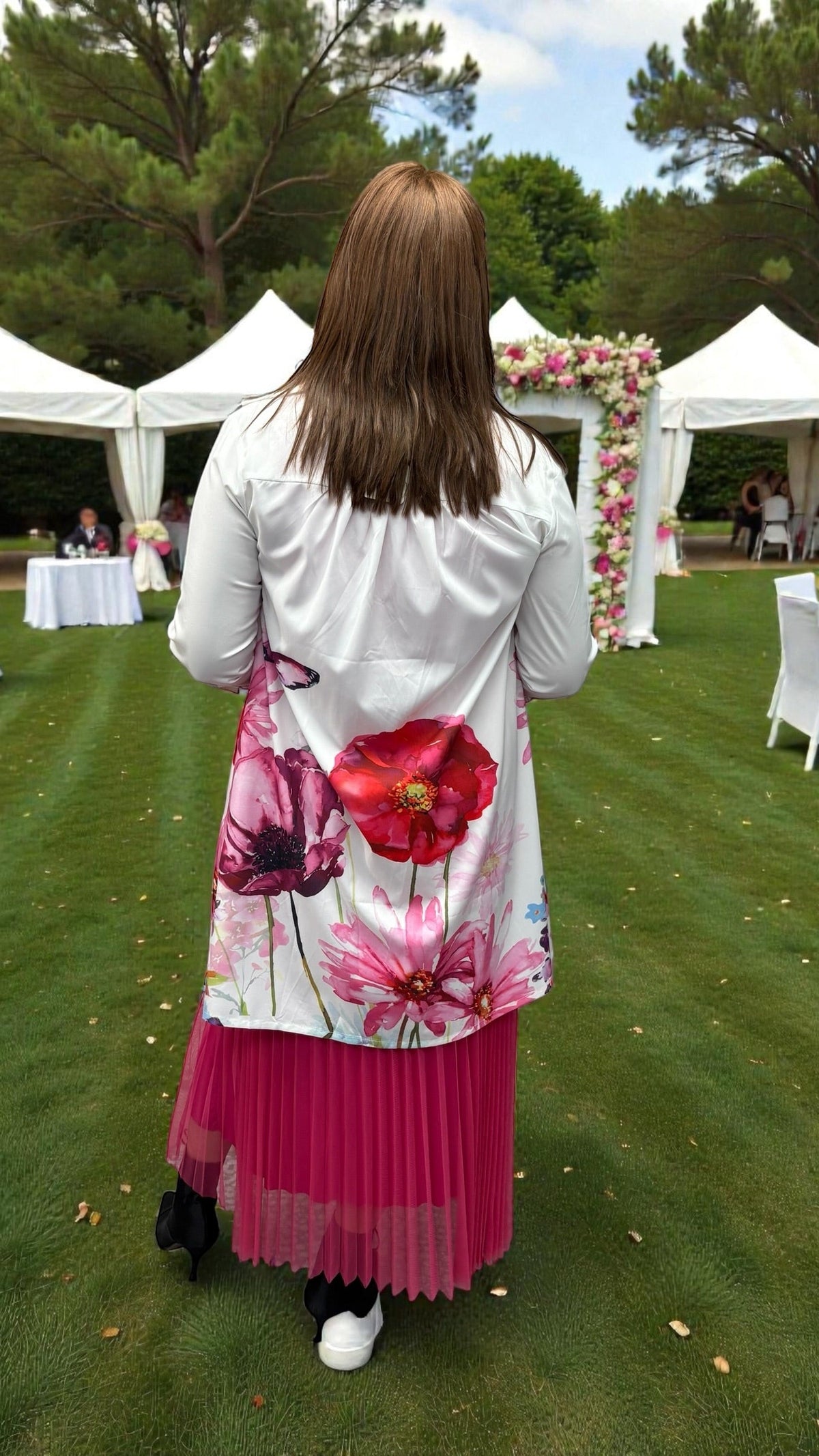 Vibrant pink dress with an easy, flattering silhouette styled for casual and everyday wear