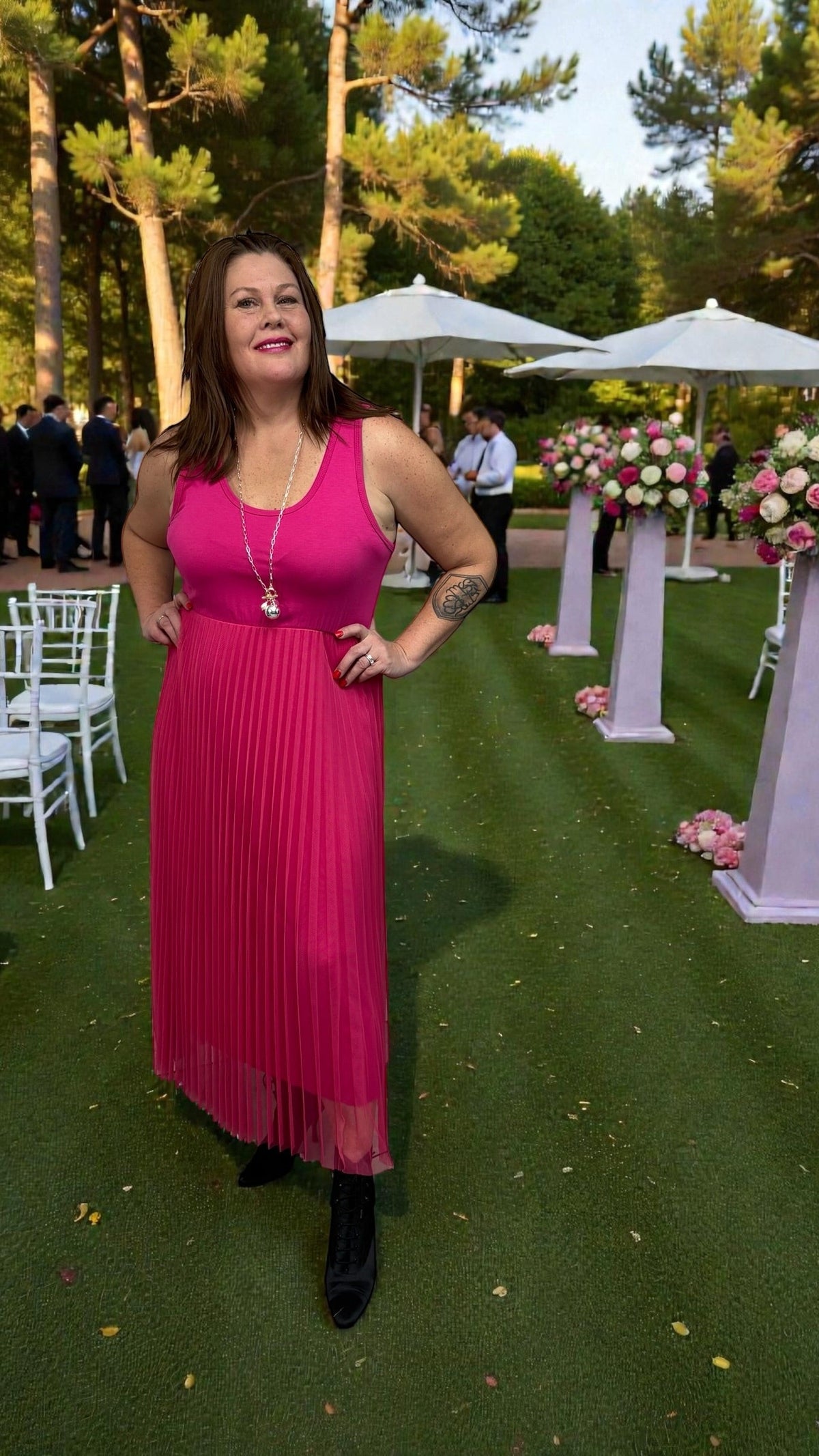 Vibrant pink dress with an easy, flattering silhouette styled for casual and everyday wear