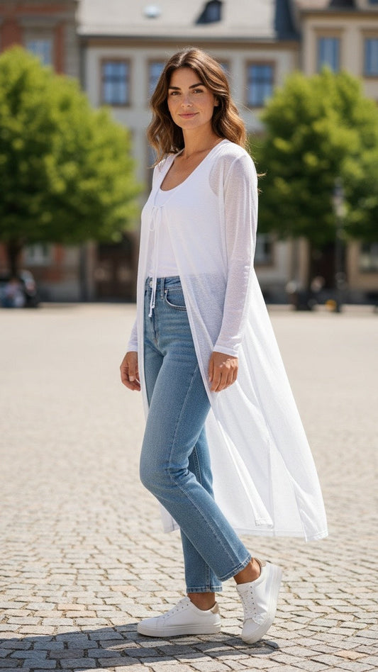 Long white polyester coverup with lightweight, flowy silhouette, versatile for swim, casual, or layered over dresses