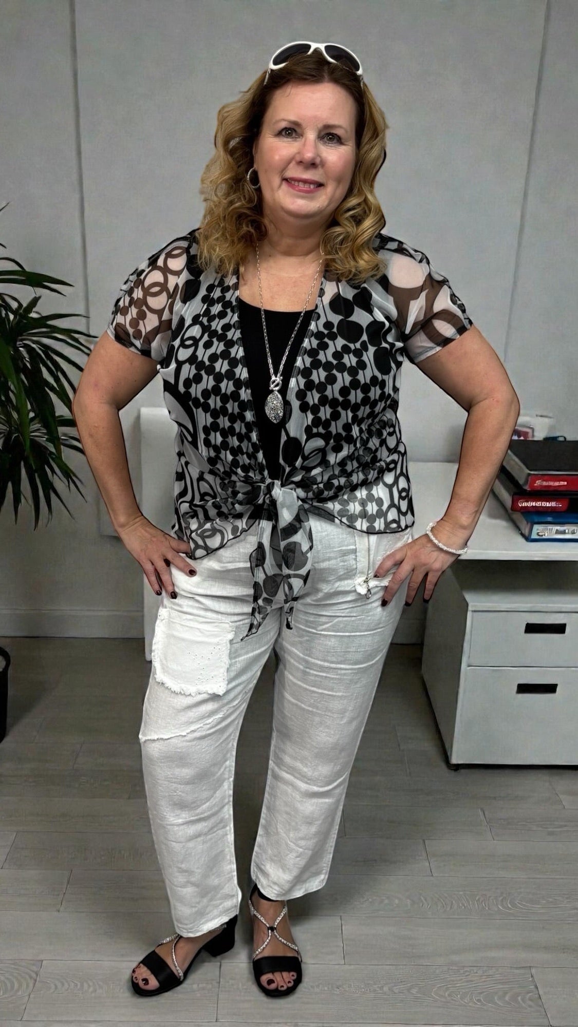 Black and white short sleeve bolero, stretchy and lightweight, perfect for effortless layering and travel