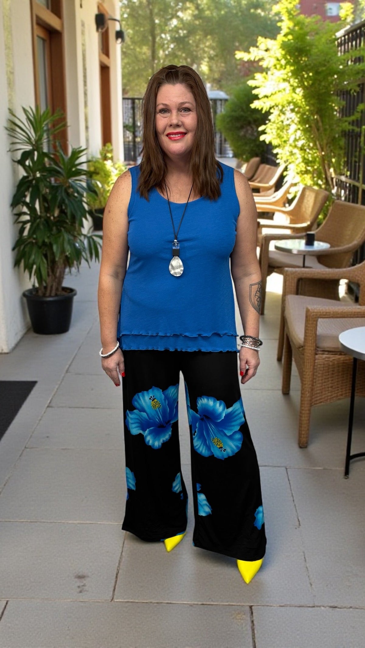 Canadian-made adjustable pants with elastic waist, can be tied at the ankle for tapered fit or worn loose as palazzo pants, designed for comfort and versatile everyday style