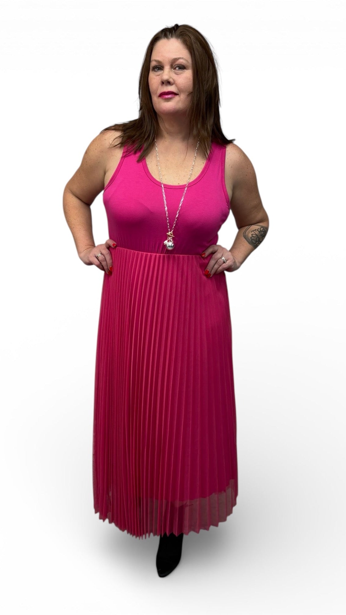 Vibrant pink dress with an easy, flattering silhouette styled for casual and everyday wear