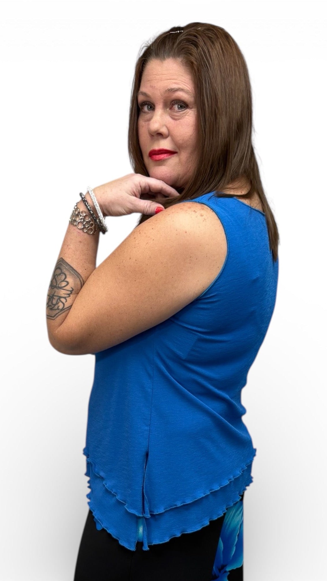 Double layered tank top by RAPZ Canada with higher neckline, side slits, and flattering full-coverage fit