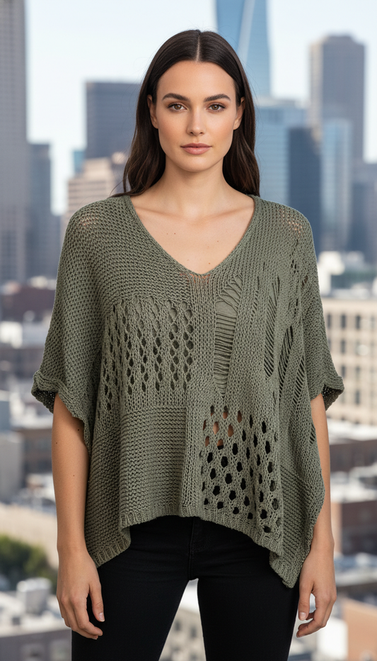 Women’s V-neck crochet top with short sleeves, delicate cutouts, and lightweight breathable fabric, perfect layered over a tank
